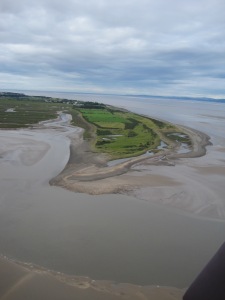 Grune Point with the town of Silloth in the distance, Skinburness Marsh to the left and on the right the Galloway coast
